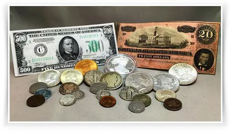 Photo of rare dollar bills and vintage coins